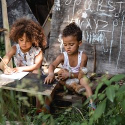 selective-focus-of-african-american-kid-writing-ne-2024-11-14-05-16-51-utc-NQT875M